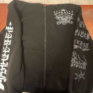 Black Zip-Up Sweater with Graphic Design